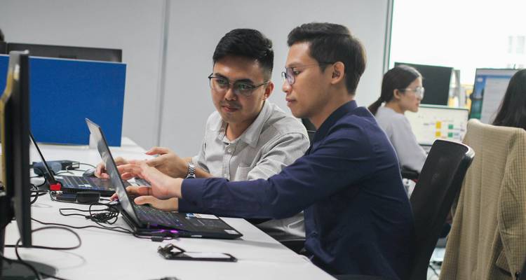  Developers collaborating on data validation tasks 